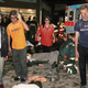 Dazed record-store clerks stagger away from the scene of the roof collapse.